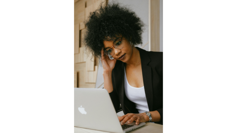 woman with freelance challenges and freelance problems laptop